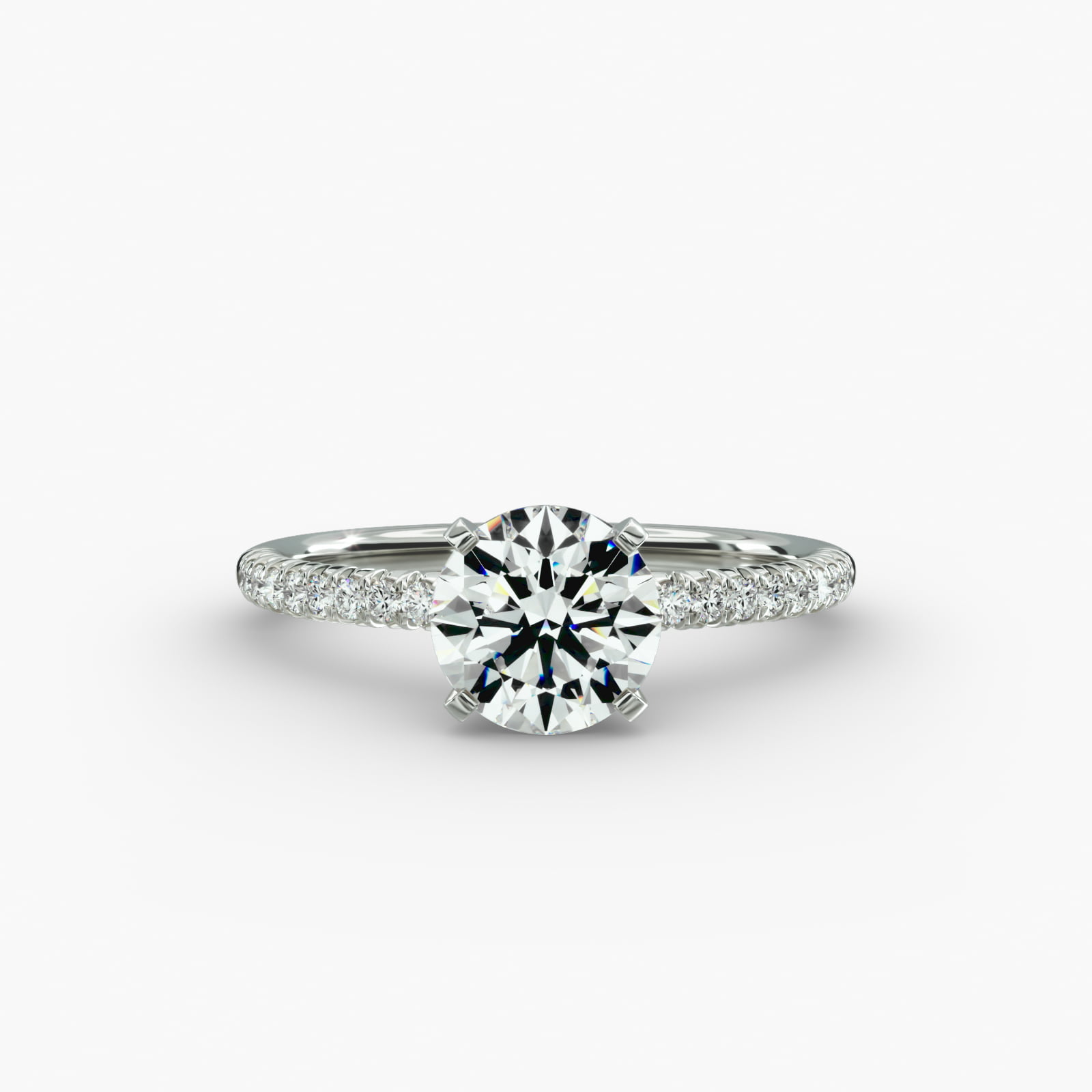 A studio shot of a **Hearts and Arrows Diamond Engagement Ring**, highlighting the precision cut of the round diamond and the delicate pavé side stones on the 14K white gold band.