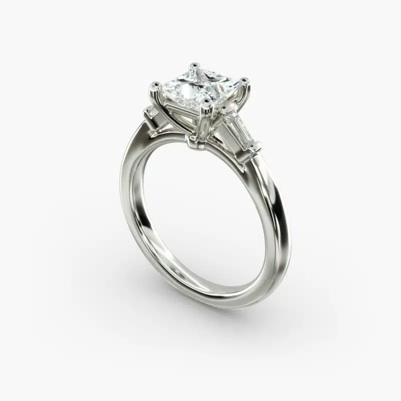A close-up studio shot of a 2 carat princess cut diamond engagement ring, highlighting the straight lines of the princess and baguette diamonds set in 14K white gold.