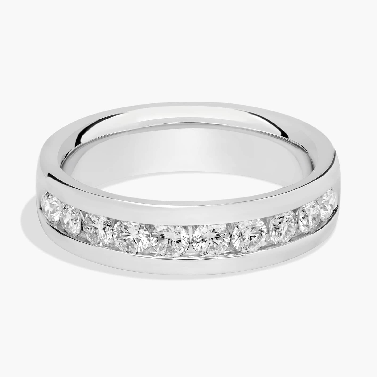 A close-up of a wide 14K white gold channel band with 1.00 ct. tw. lab grown diamonds, a top example of men's lab grown diamond rings for sale.