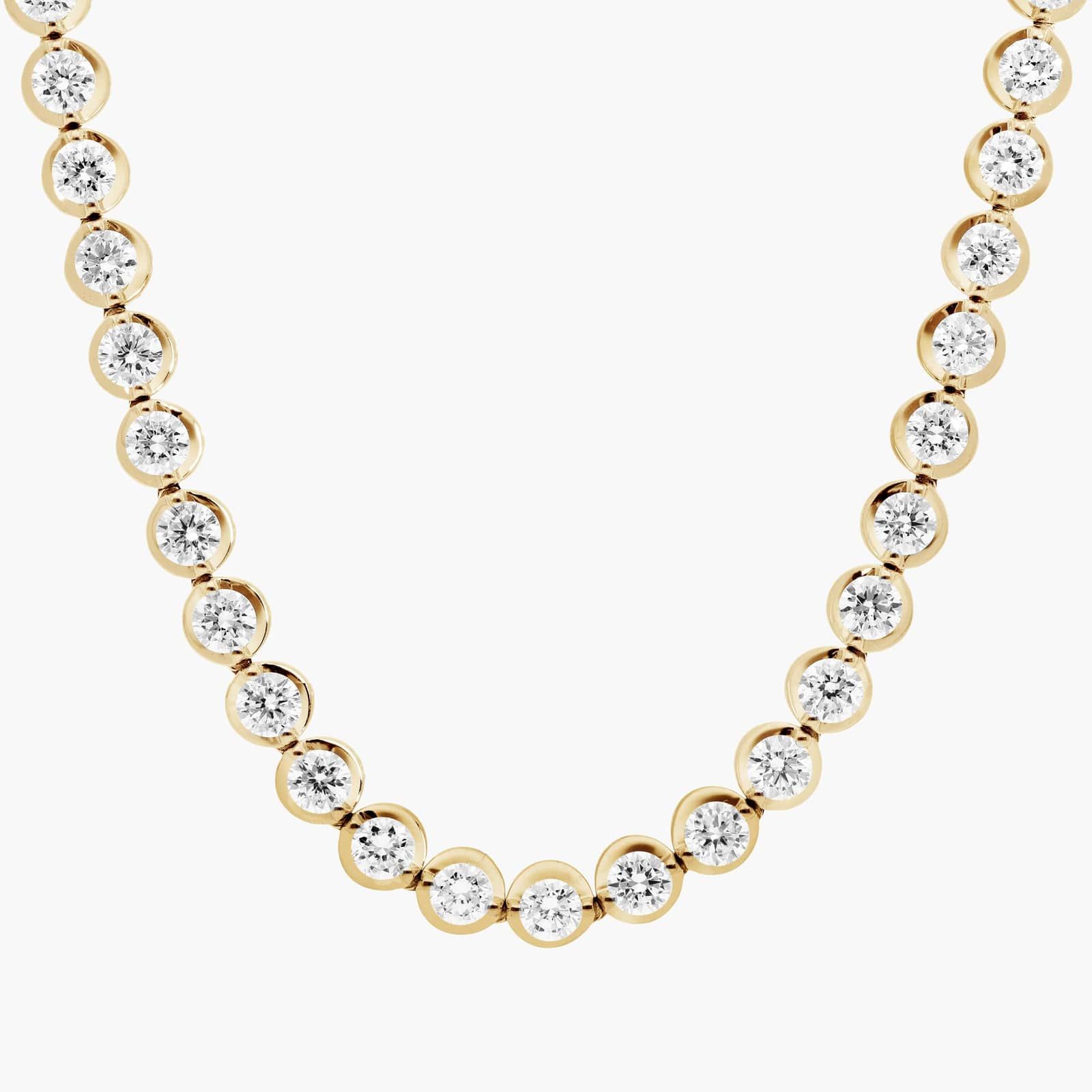 20 CTW Illusion Lab Created Diamond Tennis Necklace 1 A spectacular lab created diamond tennis necklace featuring 20 CTW of F-G/VS2-SI1 round lab-grown diamonds in an illusion setting, handcrafted in radiant 14K Yellow Gold.