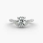 A close-up view of a 4 carat round diamond ring, highlighting the Triple Excellent cut of the lab-grown stone and the sparkling pavé setting.