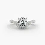 A close-up view of a 4 carat round diamond ring, highlighting the Triple Excellent cut of the lab-grown stone and the sparkling pavé setting.