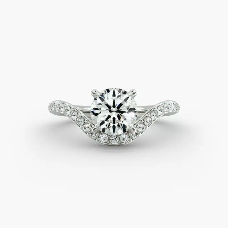 A close-up view of a 4 carat round diamond ring, highlighting the Triple Excellent cut of the lab-grown stone and the sparkling pavé setting.