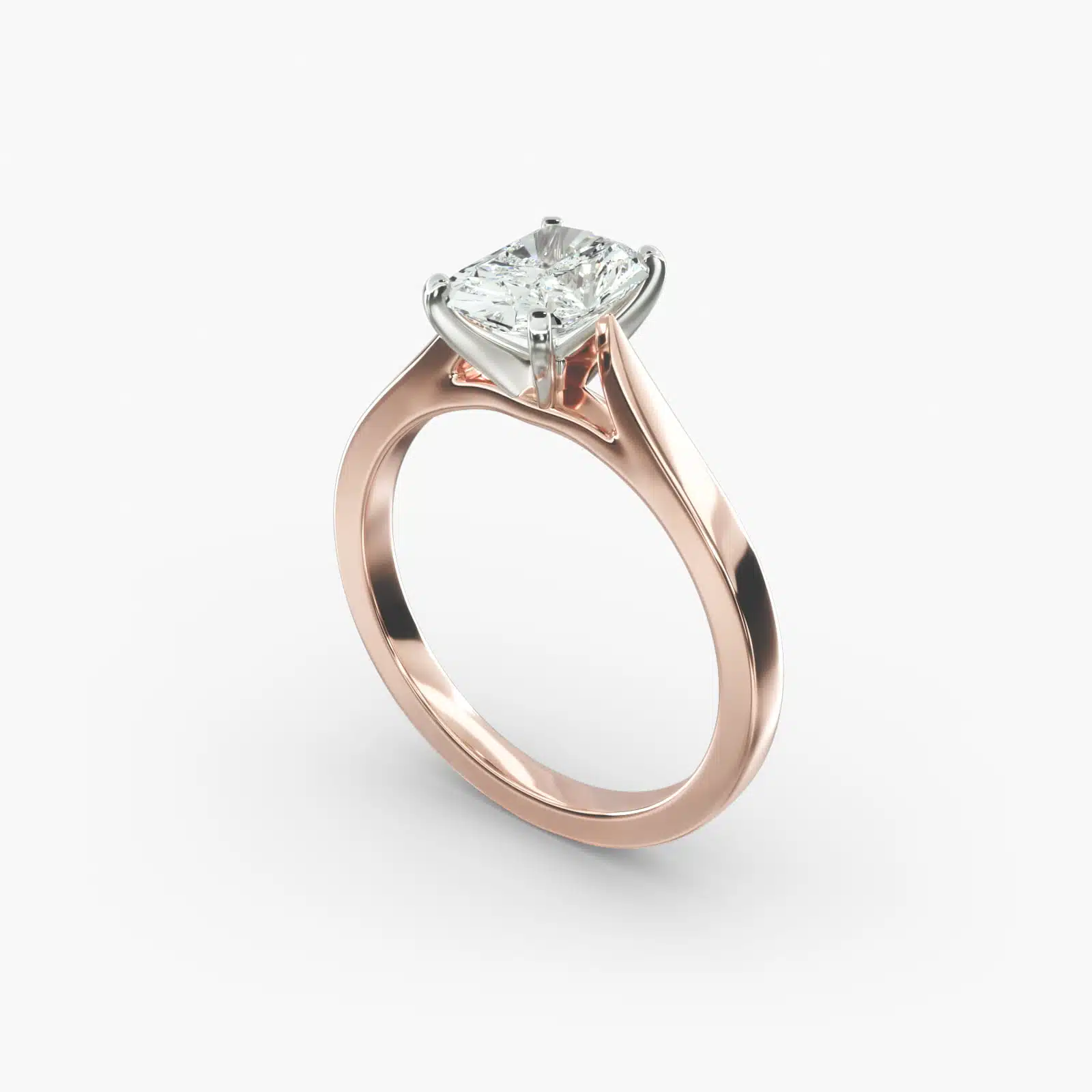 A close-up view of a rectangular radiant cut diamond solitaire, highlighting the warm rose gold band and large 7.00 ct. stone.