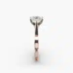 A close-up view of a rectangular radiant cut diamond solitaire, highlighting the warm rose gold band and large 7.00 ct. stone.