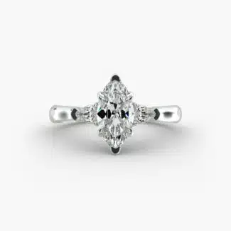 A close-up view of a marquise diamond ring with pear-shaped accents, highlighting the elongated 2.21 ratio and IF clarity.