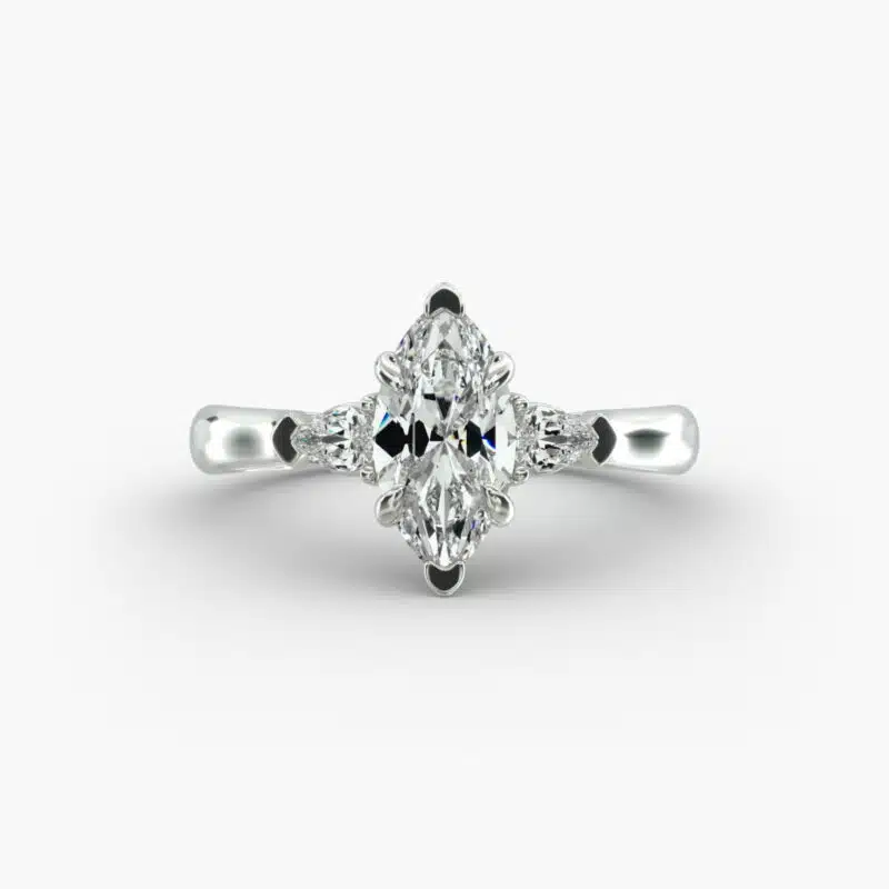 A close-up view of a marquise diamond ring with pear-shaped accents, highlighting the elongated 2.21 ratio and IF clarity.