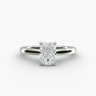 A close-up side view of a 6 ct radiant cut diamond ring, showcasing the delicate 1.60mm band and the hidden halo accent diamonds.