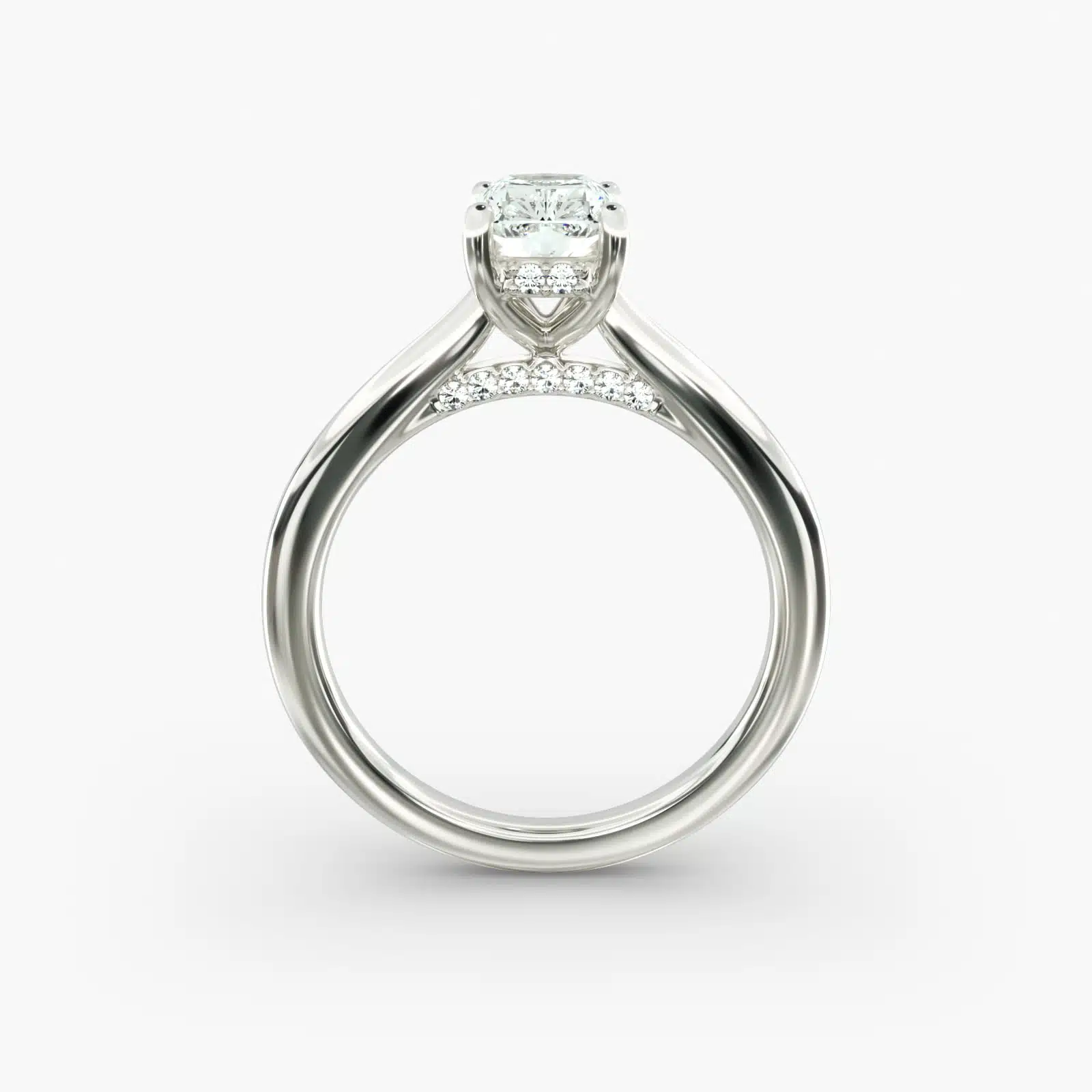 G-VS2 6 Carat Radiant Cut Diamond Ring | Lab-Grown Hidden Halo in 14k White Gold side view 2 A close-up side view of a 6 ct radiant cut diamond ring, showcasing the delicate 1.60mm band and the hidden halo accent diamonds.