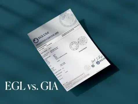 A prominent EGL USA diamond certificate against a dark background with the text EGL vs. GIA, signaling a comparison and review of diamond grading labs.
