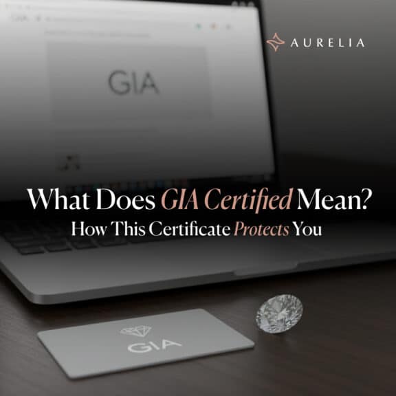 A minimal feature image for a blog post showing a close-up of a diamond, a GIA grading card, and a laptop screen with the GIA logo, illustrating how GIA certification protects the buyer.