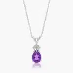 A Pear Shaped Amethyst (0.65 CT min) and Tri-Diamond Birthstone Pendant Necklace in 14K White Gold, a unique and meaningful option among Luxury Push Present Ideas.
