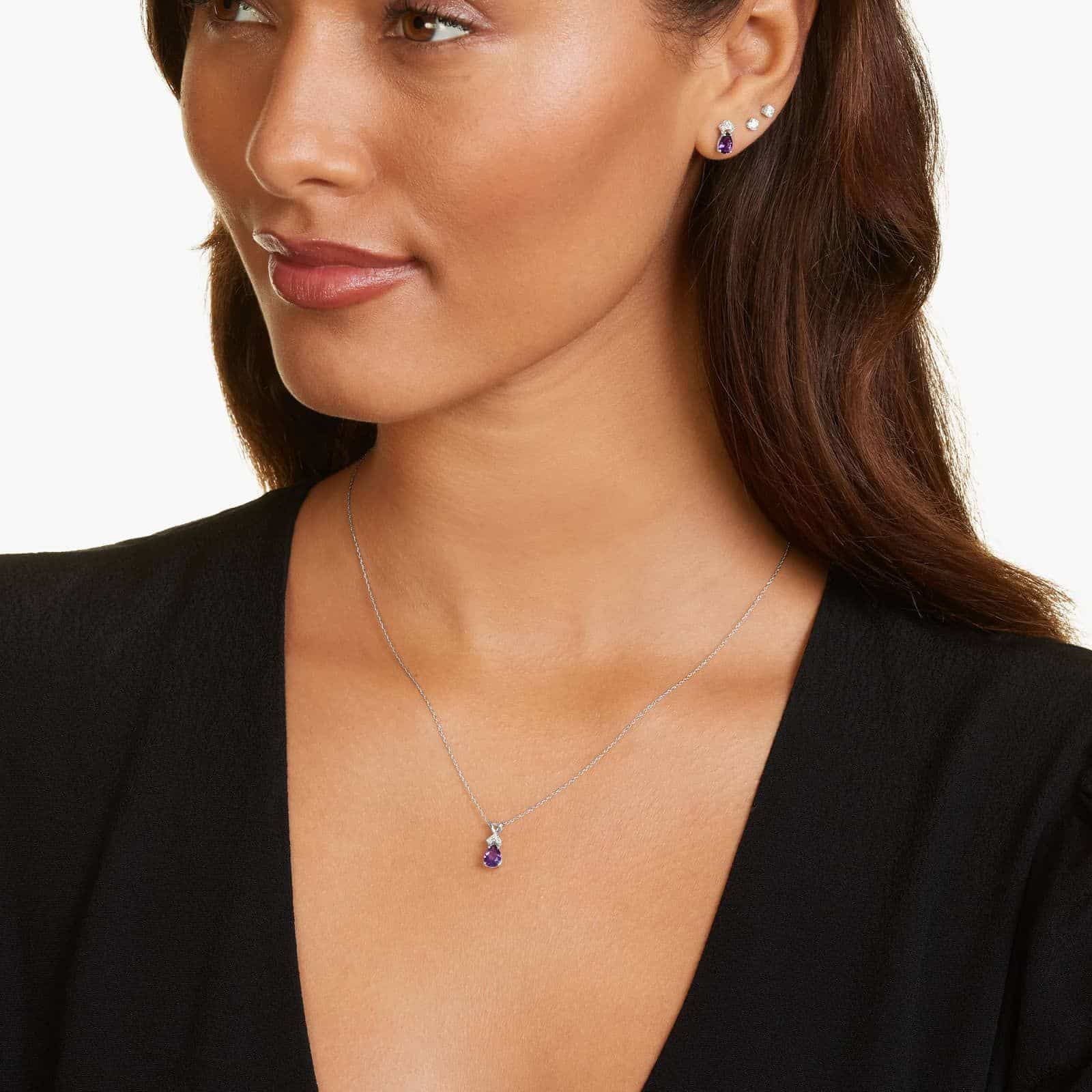 14K White Gold Pear Shaped Amethyst & Tri-Diamond Birthstone Pendant Necklace model view 2 A Pear Shaped Amethyst (0.65 CT min) and Tri-Diamond Birthstone Pendant Necklace in 14K White Gold, a unique and meaningful option among Luxury Push Present Ideas.