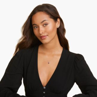 A Pear Shaped Amethyst (0.65 CT min) and Tri-Diamond Birthstone Pendant Necklace in 14K White Gold, a unique and meaningful option among Luxury Push Present Ideas.