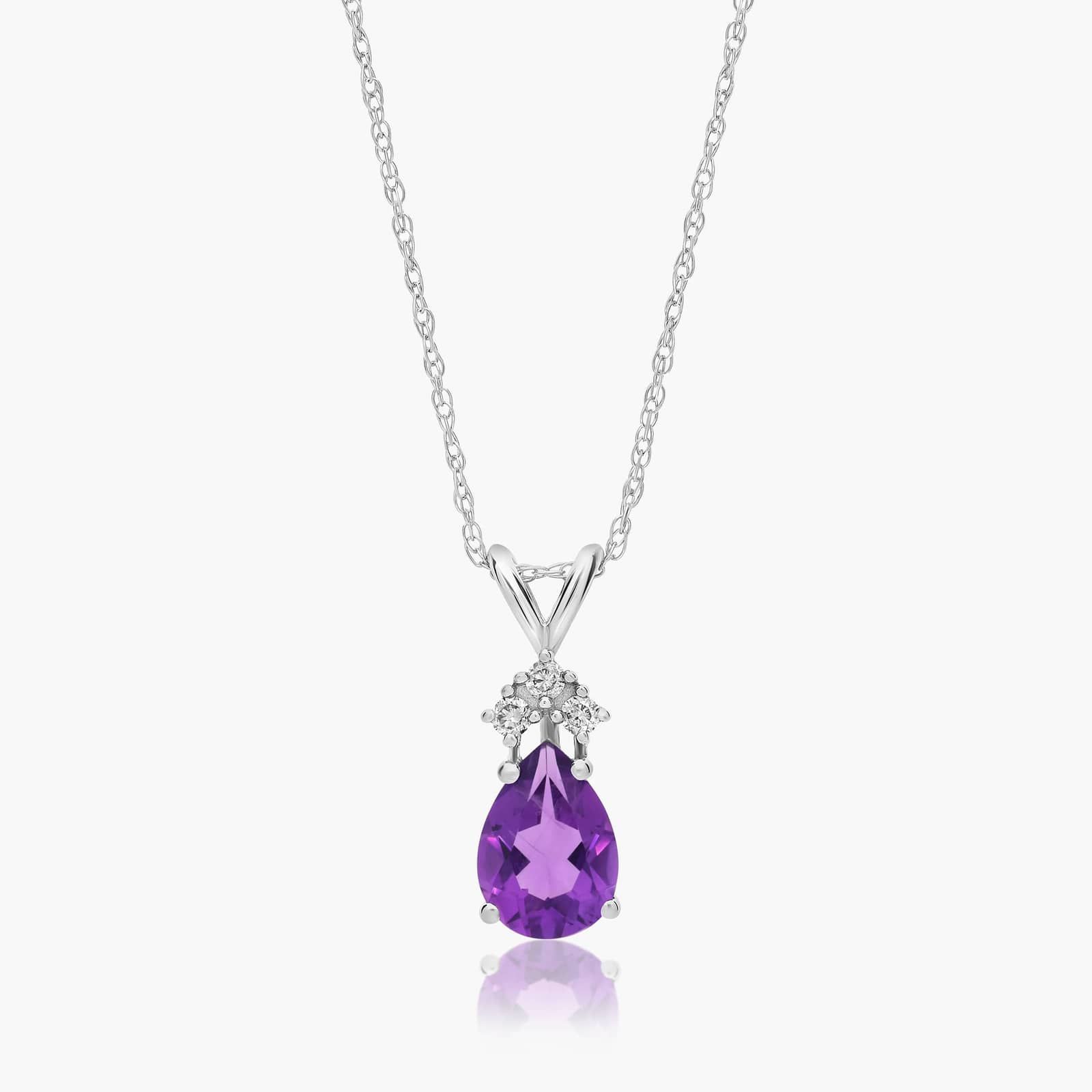 14K White Gold Pear Shaped Amethyst & Tri-Diamond Birthstone Pendant Necklace A Pear Shaped Amethyst (0.65 CT min) and Tri-Diamond Birthstone Pendant Necklace in 14K White Gold, a unique and meaningful option among Luxury Push Present Ideas.