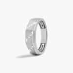 A Satin Oblique Channel Diamond Wedding Band For Him (7.00mm) with 0.10 CTW of diamonds, set in 14K White Gold.
