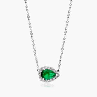 An East-West Pear Emerald (0.65 CT min) and Diamond Halo Necklace (0.14 CTW) in 18K White Gold, a modern and high-quality option among Luxury Push Present Ideas.