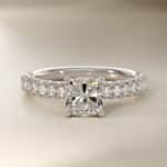 A spectacular 4.00 Carat Elongated Cushion Cut Diamond Ring (E/VVS1 Lab-Grown Diamond) set in a French Pavé Platinum band.