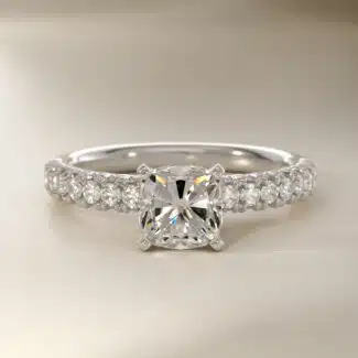 A spectacular 4.00 Carat Elongated Cushion Cut Diamond Ring (E/VVS1 Lab-Grown Diamond) set in a French Pavé Platinum band.