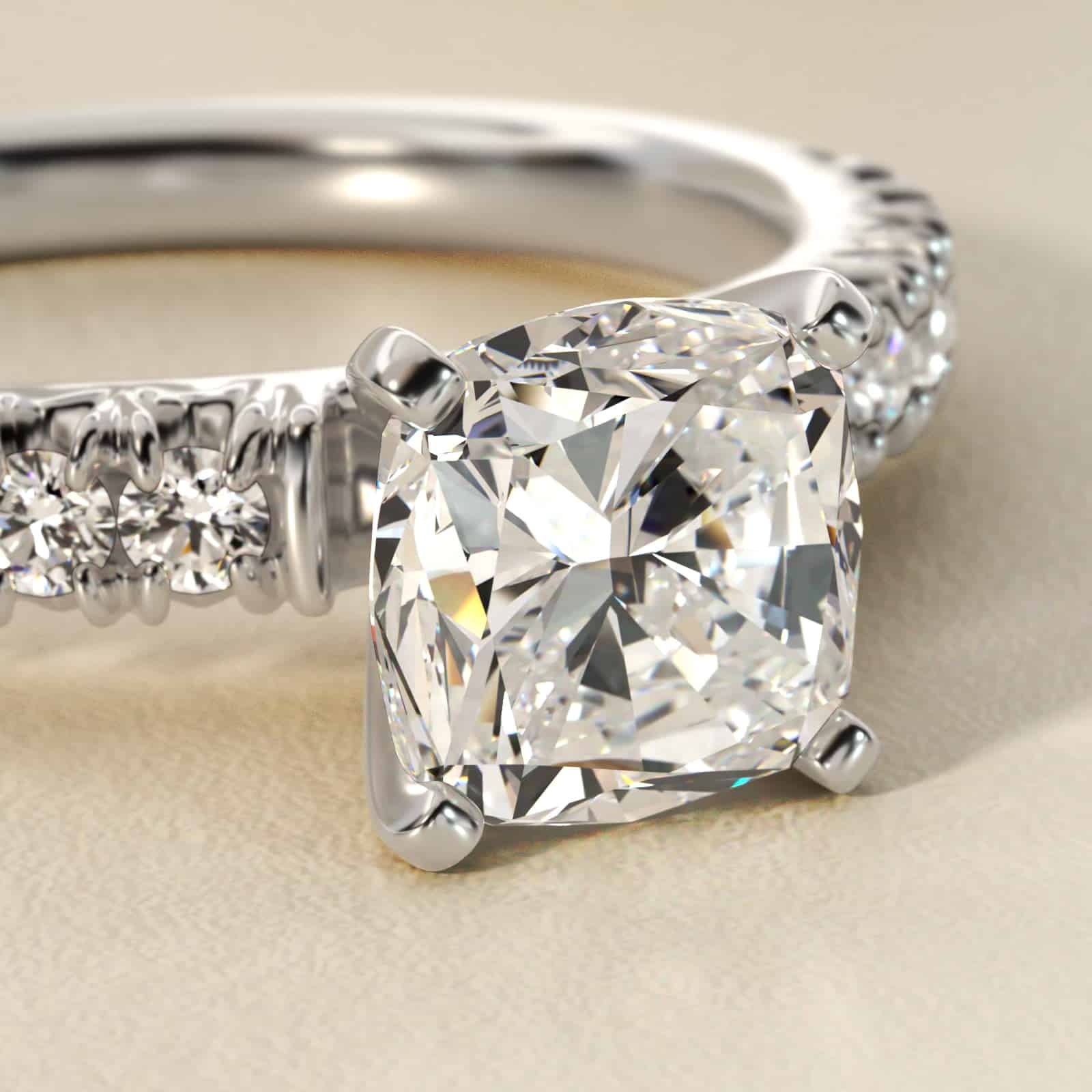 close view of A spectacular 4.00 Carat Elongated Cushion Cut Diamond Ring (E/VVS1 Lab-Grown Diamond) set in a French Pavé Platinum band.