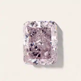A GIA-certified 4.09 carat Radiant Shape Fancy Purplish Pink Diamond with VVS2 clarity, one of the largest Loose Pink Diamonds For Sale.