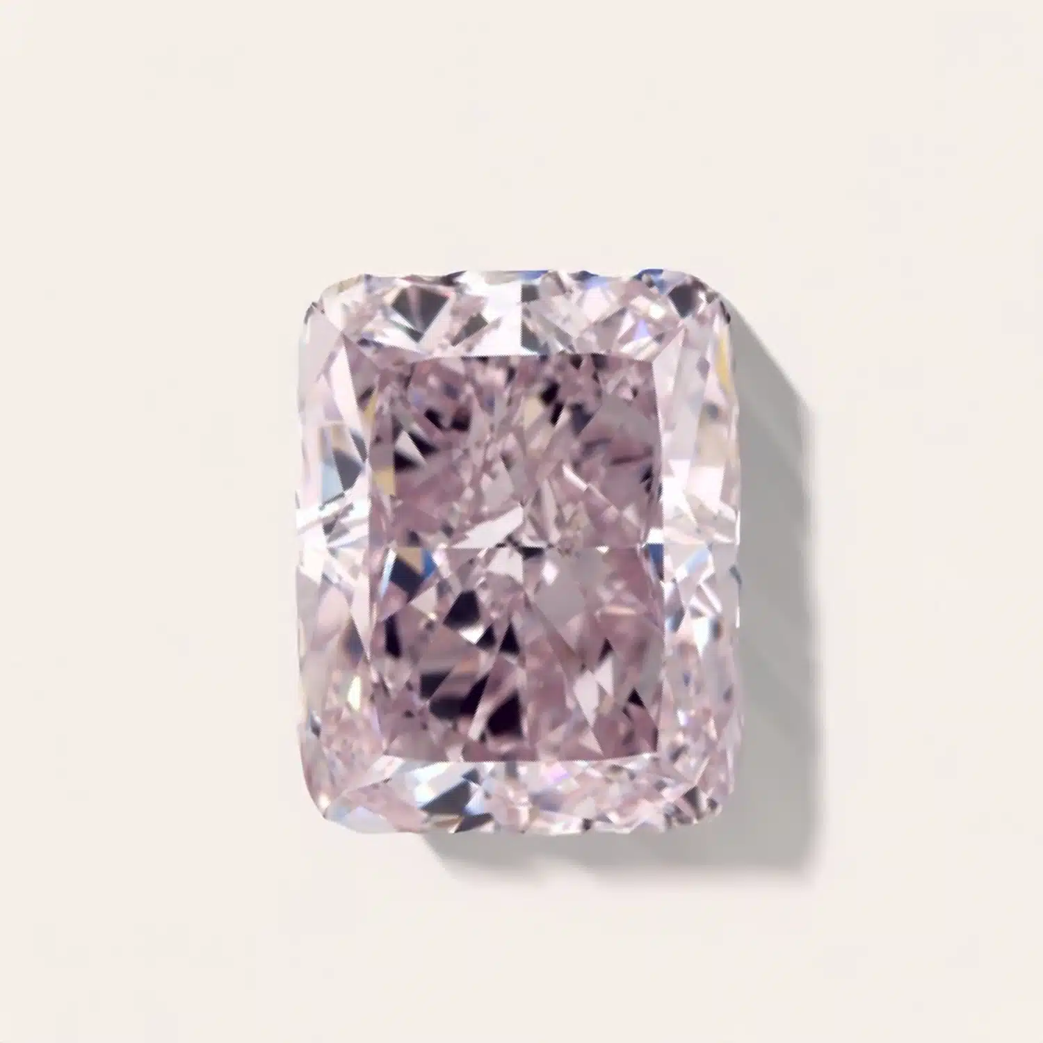 A GIA-certified 4.09 carat Radiant Shape Fancy Purplish Pink Diamond with VVS2 clarity, one of the largest Loose Pink Diamonds For Sale.