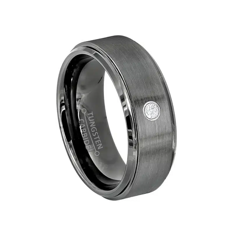 An 8mm Brushed Gunmetal Tungsten Mens Wedding Bands With Diamonds with a single diamond set in a 14kt White Gold Bezel.
