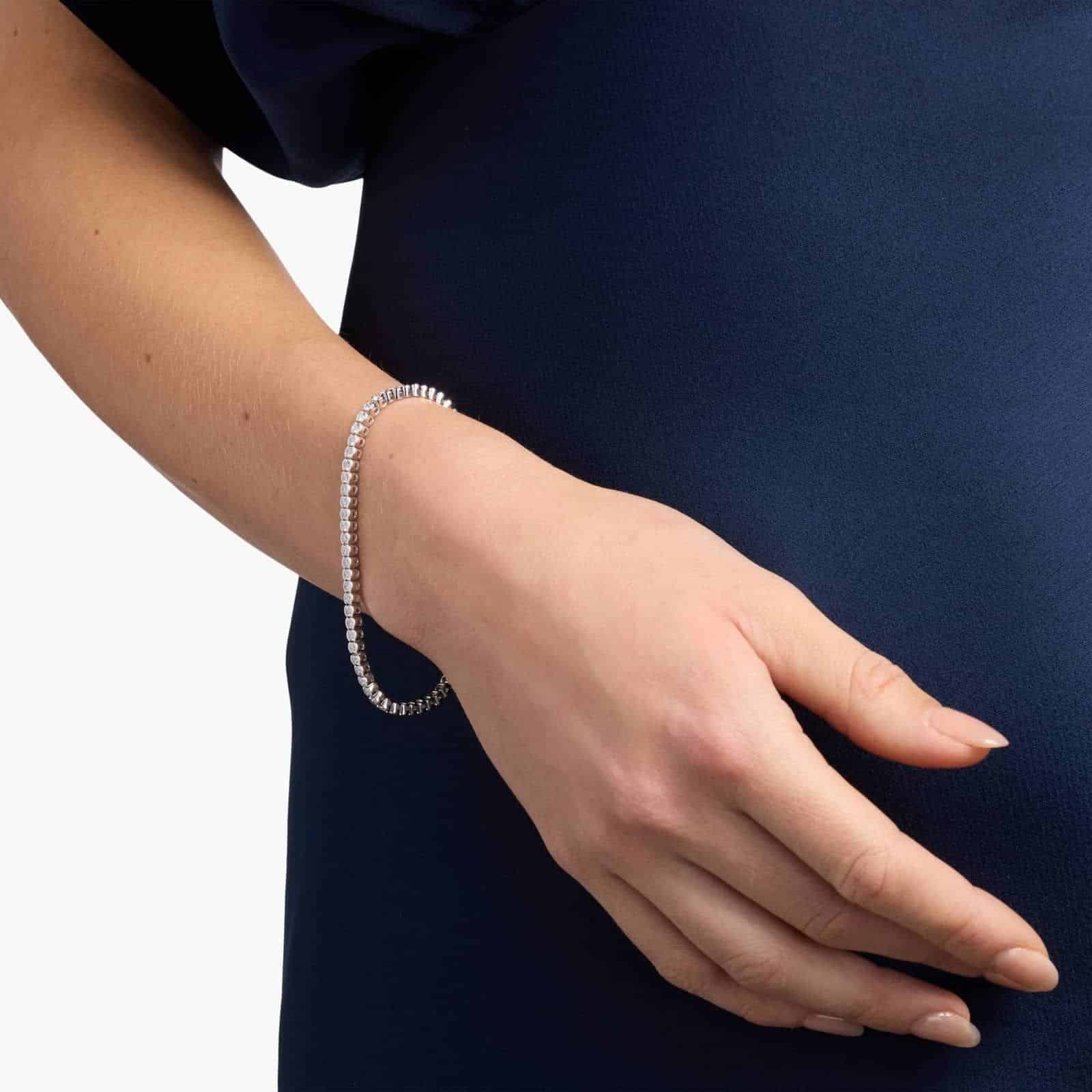 A Lab-Grown Diamond Bezel and Prong Tennis Bracelet (2 3/4 CTW) in 14K White Gold, a high-value option for Luxury Push Present Ideas.