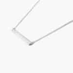 A Channel Set Bar Diamond Necklace with Baguette Cut Diamonds (1/2 CTW) in 14K White Gold, a modern suggestion among Luxury Push Present Ideas and push present necklace for mom gifts.