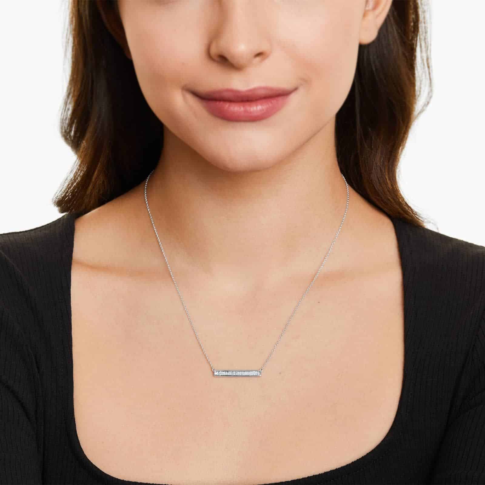 Channel Set Bar Design Necklace With Baguette Cut Diamonds In 14K White Gold model view 2 A Channel Set Bar Diamond Necklace with Baguette Cut Diamonds (1/2 CTW) in 14K White Gold, a modern suggestion among Luxury Push Present Ideas and push present necklace for mom gifts.
