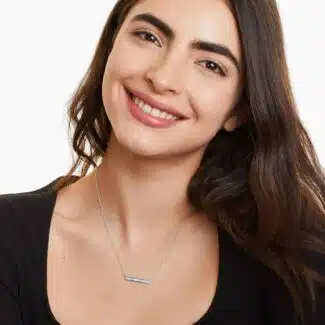 A Channel Set Bar Diamond Necklace with Baguette Cut Diamonds (1/2 CTW) in 14K White Gold, a modern suggestion among Luxury Push Present Ideas and push present necklace for mom gifts.