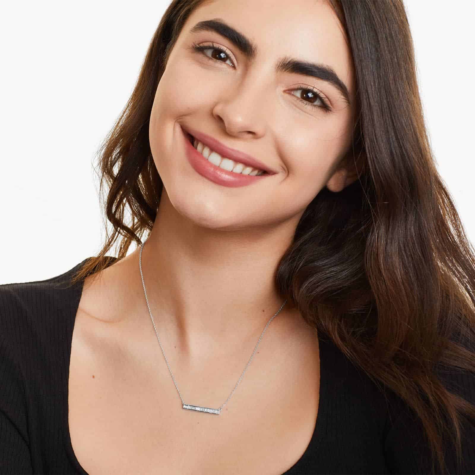 Channel Set Bar Design Necklace With Baguette Cut Diamonds In 14K White Gold model view 3 A Channel Set Bar Diamond Necklace with Baguette Cut Diamonds (1/2 CTW) in 14K White Gold, a modern suggestion among Luxury Push Present Ideas and push present necklace for mom gifts.