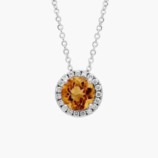 A Citrine and Diamond Halo Pendant in 14K White Gold, featuring a 1.2 CTW citrine, a classic suggestion among Luxury Push Present Ideas.