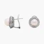 A pair of Classic Akoya Cultured Pearl Double Halo Diamond Earrings, 1.01 CTW set in 18K White Gold with Omega Clip backings.
