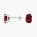 A pair of Oval Garnet Stud Earrings in 14K White Gold, a stylish and affordable option among Luxury Push Present Ideas and birthing gifts for mom.