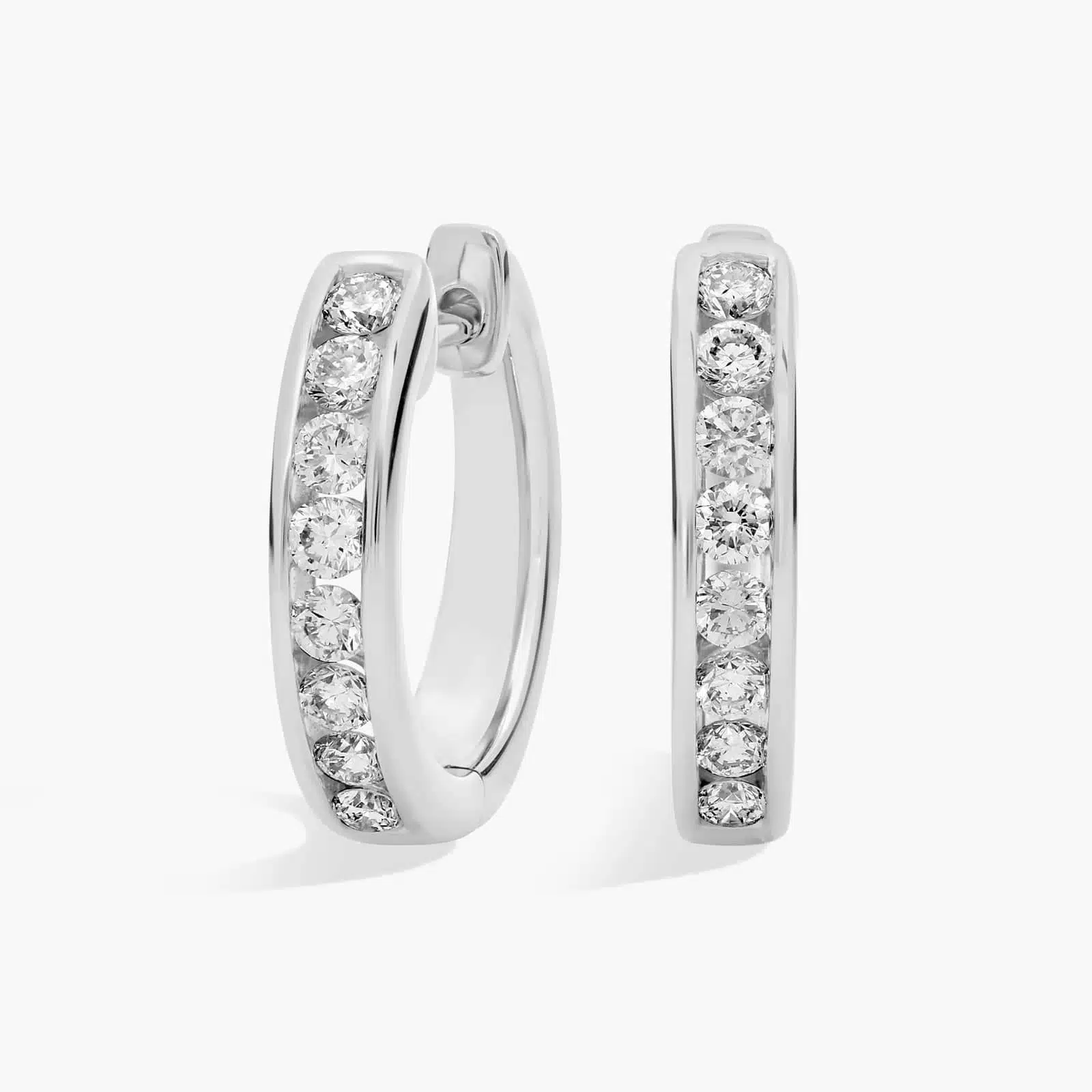 Lab Grown Diamond Channel Hoop Earrings in 14k White Gold A pair of 14K White Gold Channel Hoop Earrings with 1/2 CTW of lab-grown diamonds, a highly practical choice among Luxury Push Present Ideas and diamond earrings push present options.