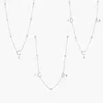 A personalized station initial necklace in 14K White Gold featuring 0.95 CTW lab-grown diamonds in a bezel setting, one of the best Luxury Push Present Ideas.