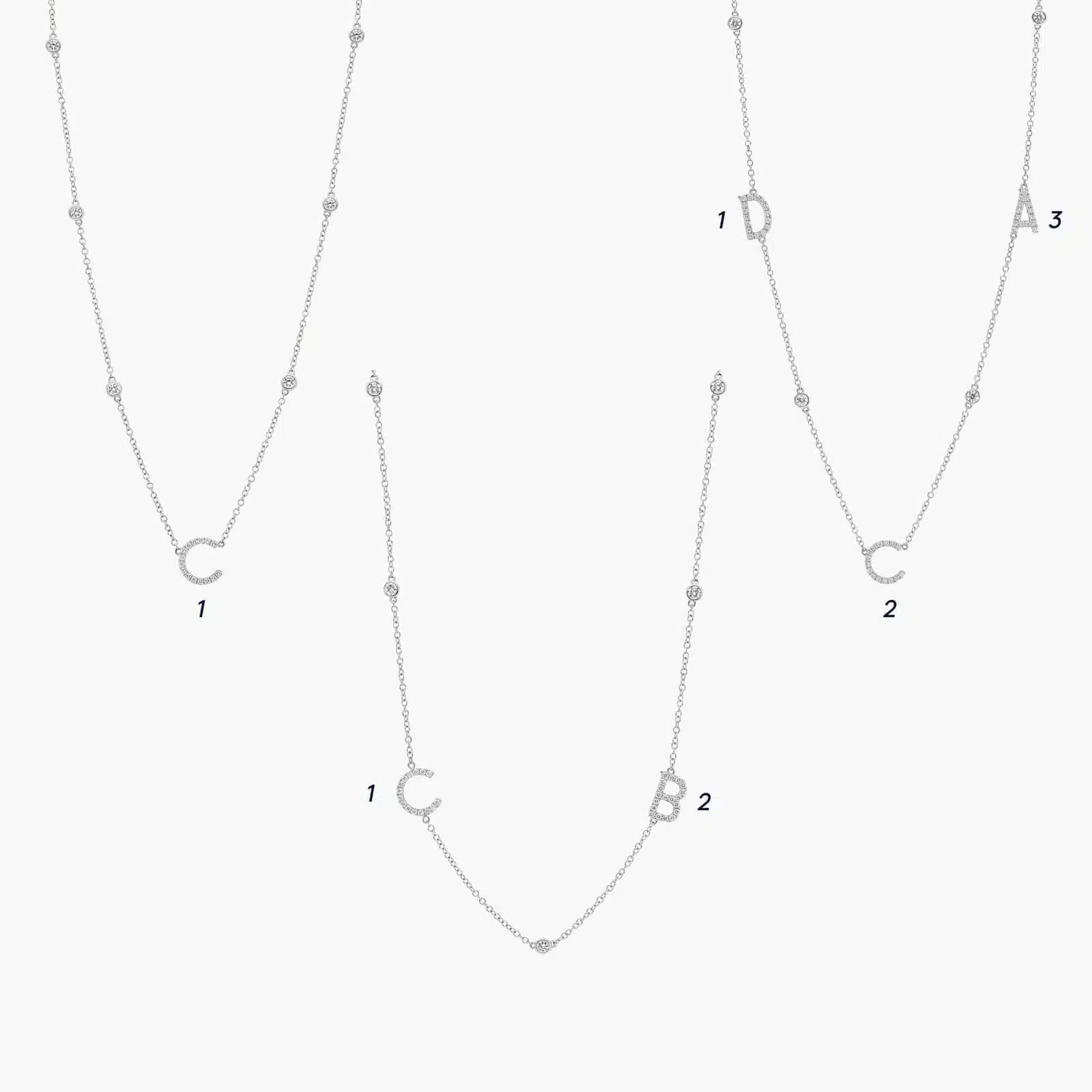 A personalized station initial necklace in 14K White Gold featuring 0.95 CTW lab-grown diamonds in a bezel setting, one of the best Luxury Push Present Ideas.