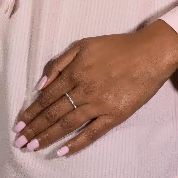 Round Caydia Lab Grown Diamond Eternity Band 18K White Gold on hand A 5/8 CTW Round Caydia Lab-Grown Diamond Eternity Band in 18K White Gold, a superior choice among Luxury Push Present Ideas and push present eternity ring styles.