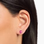 A pair of Emerald Cut Ruby Stud Earrings in 14K White Gold, a classic suggestion among Luxury Push Present Ideas for a new mother.