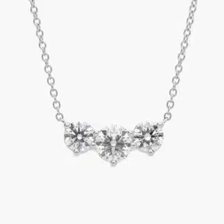 A Premier Three-Stone Diamond Necklace in Platinum, 1 1/2 CTW E-F/VS2 diamonds, the ultimate choice for Luxury Push Present Ideas.
