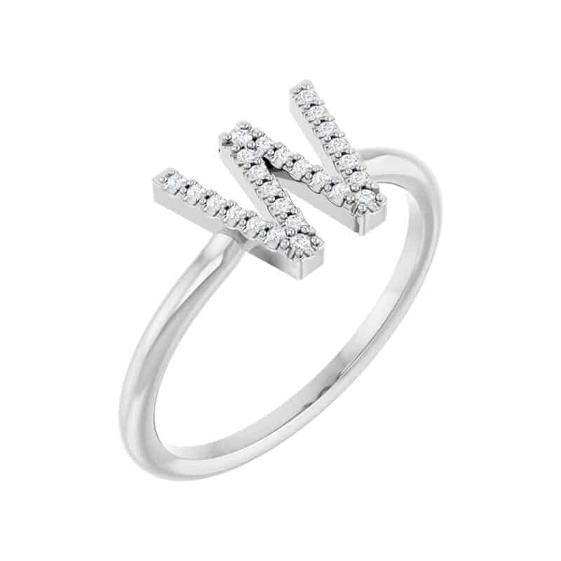 A personalized Diamond Initial Ring in solid Platinum with 0.06 CTW of natural diamonds, an enduring and luxurious choice among Luxury Push Present Ideas and push present ring options.