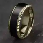 A Bastion Fluted Bevel Black Titanium and 14K Yellow Gold Mens Black Gold Wedding Bands style (8.00mm) with a brushed black center and polished gold edges.