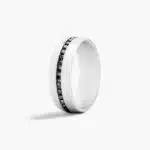 A Comfort Fit Mens White Gold Black Diamond Wedding Bands (7.50mm) in 18K White Gold with 0.40 CTW channel-set Black Diamonds.