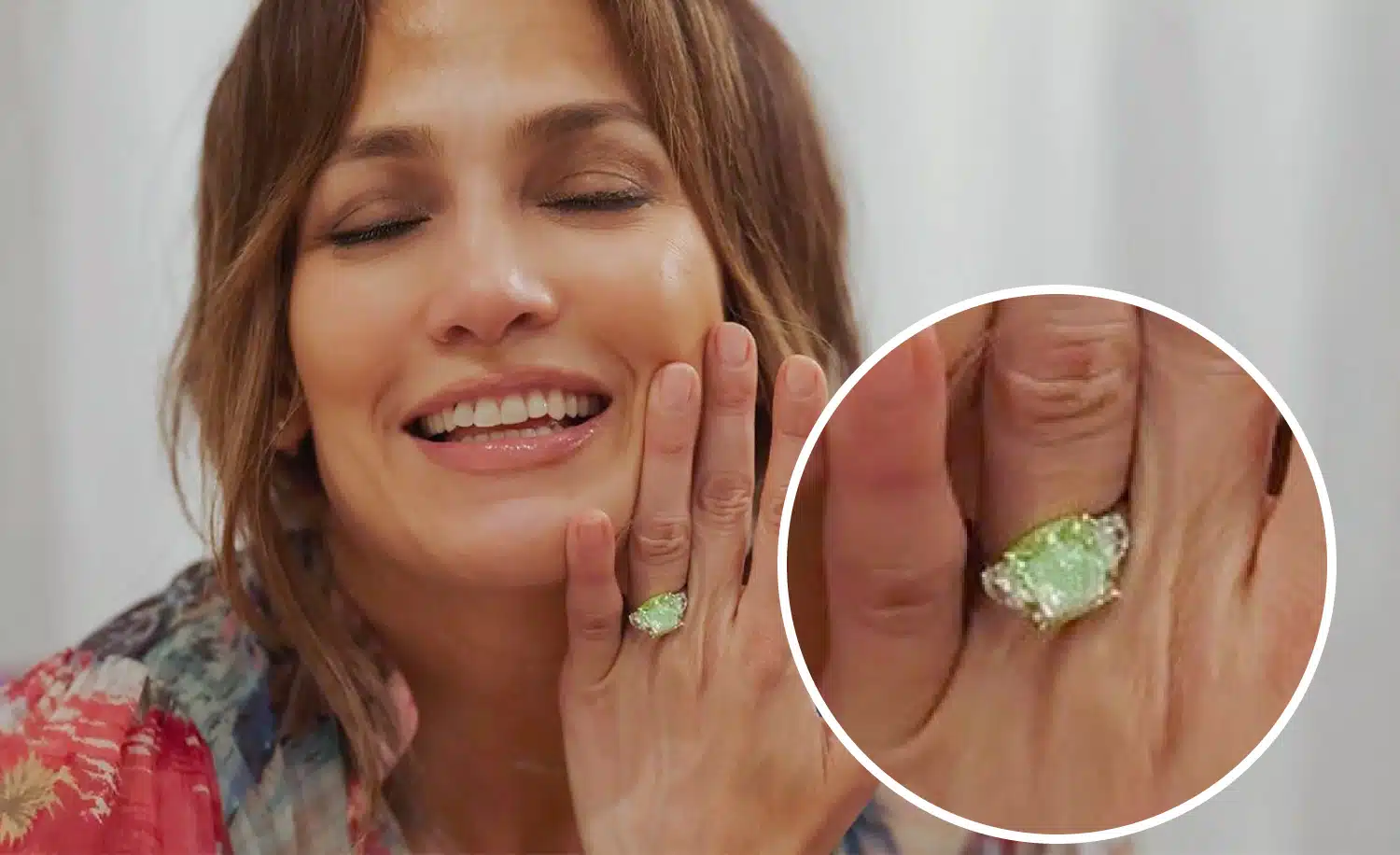 Jennifer Lopez wearing her 8.5-carat, natural fancy intense green diamond engagement ring, which is a cushion modified brilliant cut flanked by two trapezoid white diamonds.