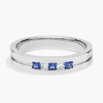 A Princess-Cut Diamond and Sapphire Mens Wedding Band With Sapphire in Platinum (4.30mm) with 0.12 CTW diamonds.