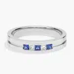 A Princess-Cut Diamond and Sapphire Mens Wedding Band With Sapphire in Platinum (4.30mm) with 0.12 CTW diamonds.
