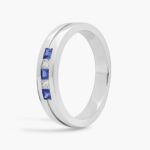A Princess-Cut Diamond and Sapphire Mens Wedding Band With Sapphire in Platinum (4.30mm) with 0.12 CTW diamonds.