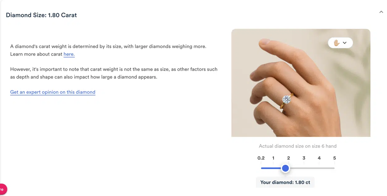 Rare Carat's diamond size visualizer, showing the 1.80 carat diamond on a hand model to help buyers assess finger coverage and prevent "size anxiety."