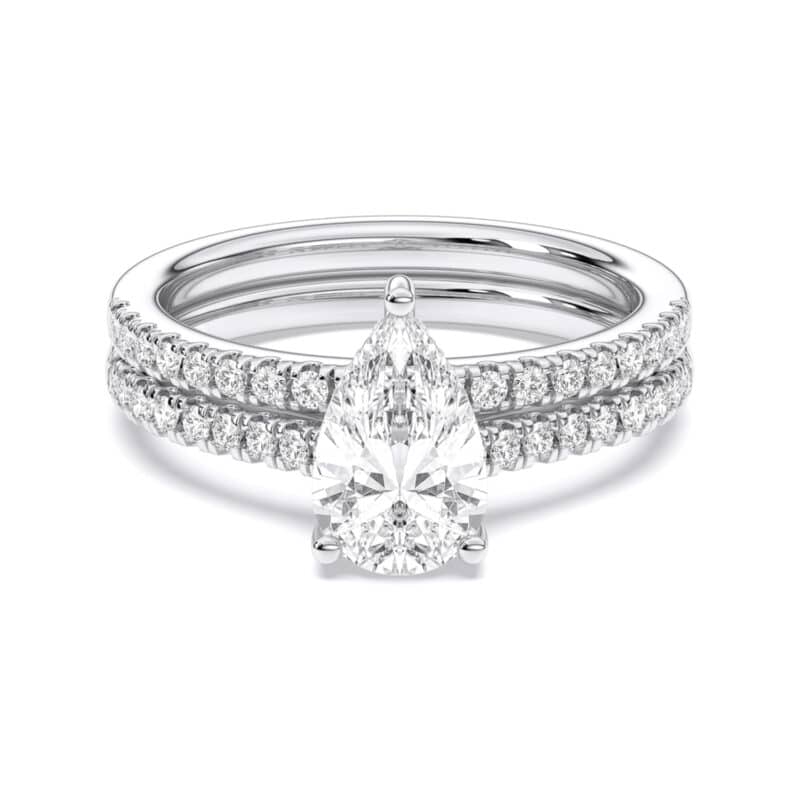 A 1.55 Carat Pear Shape Ring With Wedding Band set in White Gold, featuring a 1.00 CT Pear-shaped diamond engagement ring and a diamond-accented matching wedding band.